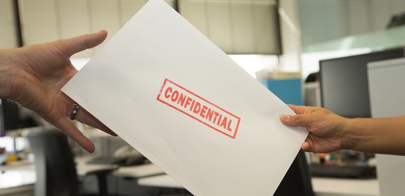 Confidential information handed to another person