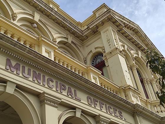 An ornate building with the words 